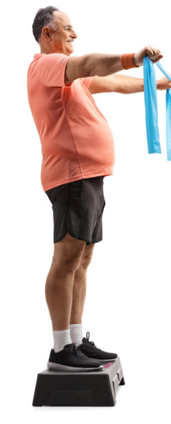 A senior man is standing on an exercise step using stretch bands to work out his back and arms